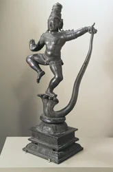 Krishna as a boy subduing the snake Kalilya, Madras, 16th-17th century
